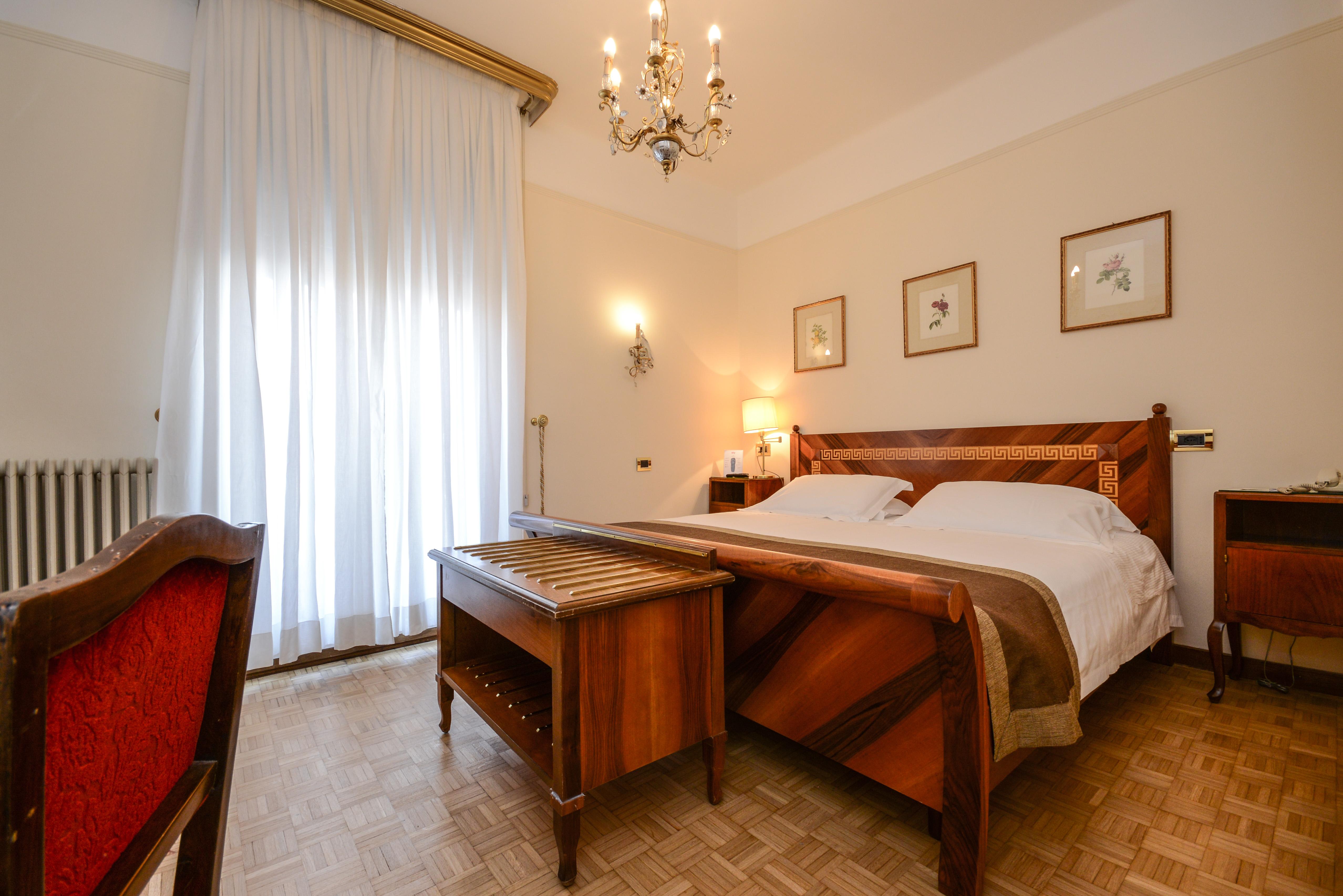 Hotel Vittoria Μπρέσια Εξωτερικό φωτογραφία A room at the hotel
